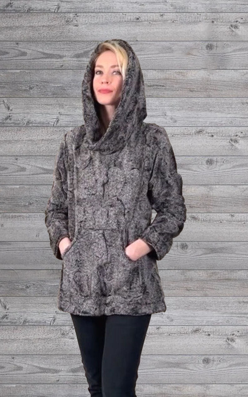 Woman wearing the Pandemonium Hooded Lounger in color Nimbus Grey, with the hood down. Made in Seattle, WA, USA