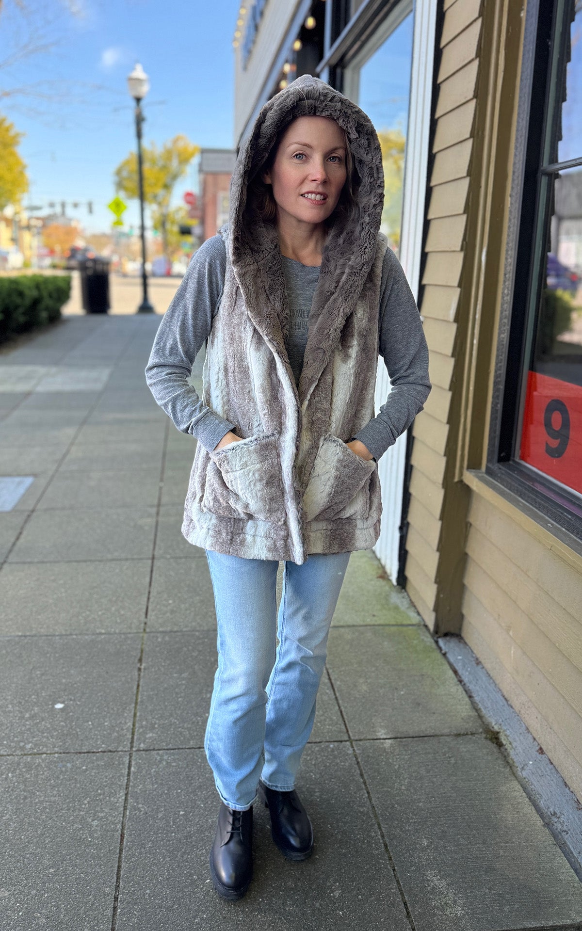 Oversized Hoody Vest in Driftwood with Cuddly Taupey on reversible side. Shown hood up and front pockets. Made in Seattle, WA, USA by Pandemonium Seattle.