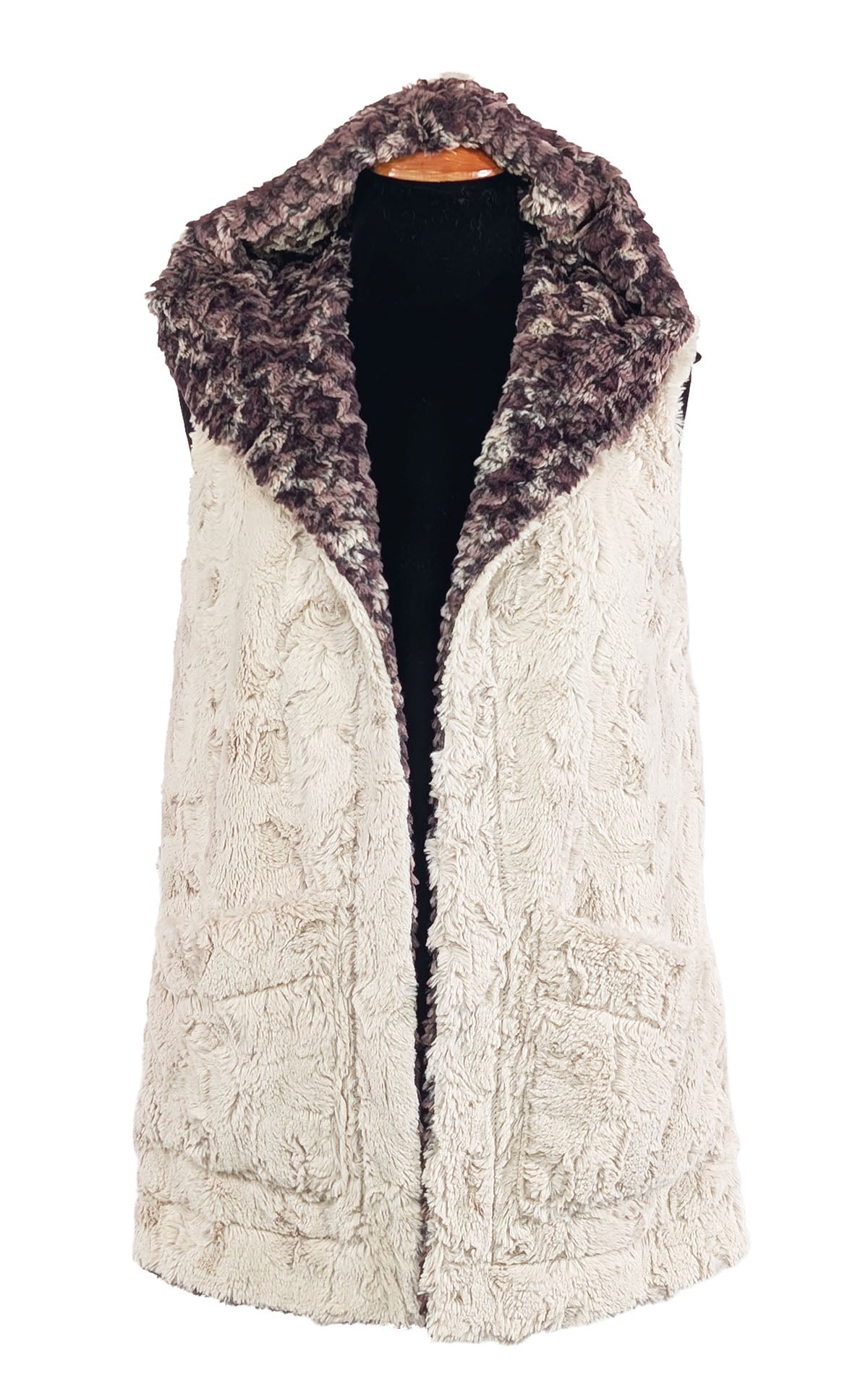 Oversized Hooded Vest in Cuddly Faux Fur Sand with Calico faux fur lining featured on a mannequin.  Handmade  in Seattle, WA , USA by Pandemonium Seattle.