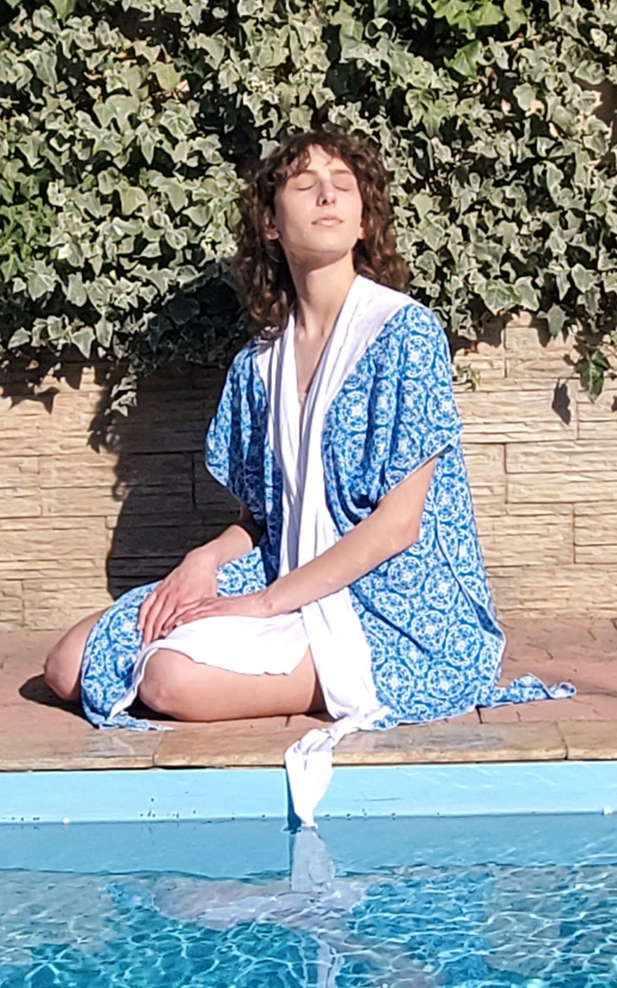 Women by pool wearing Kaftan in Mayan Batik with Milky Way | Handmade in Seattle WA | Pandemonium Millinery