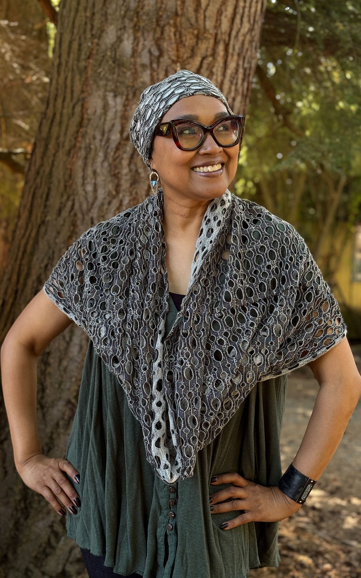 Woman wearing the wide Lunar Landing Infinity Scarf and the Rowdie Hat in Lunar Landing. Made in Seattle, WA, USA by Pandemonium Millinery.