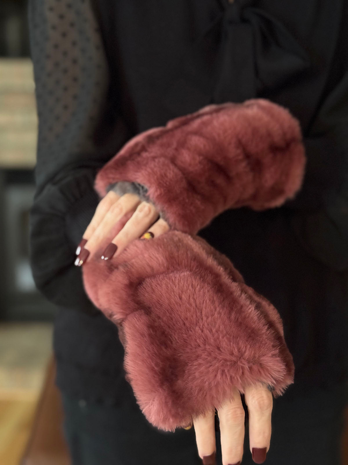 Woman wearing Royal Opulence Fingerless Gloves Short in Maple Glow. Made in Seattle, WA, USA by Pandemonium Seattle.