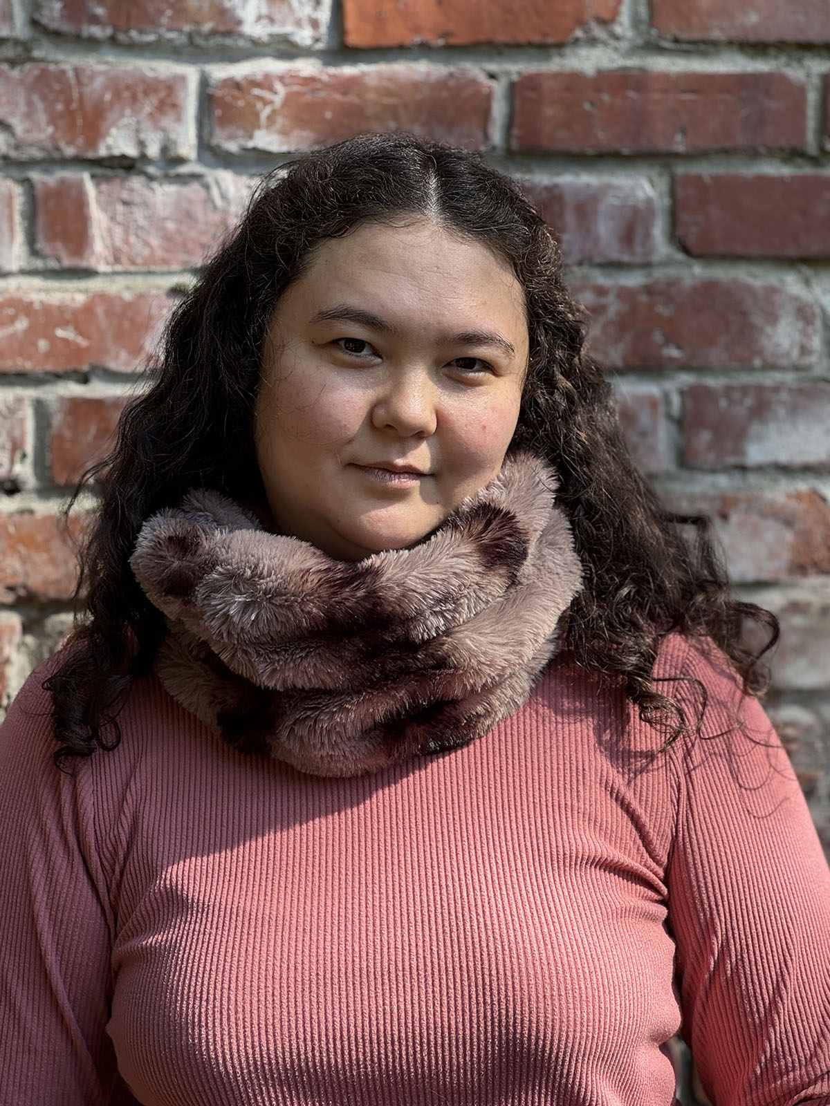 Woman wearing the Royal Opulence Neck Warmer in Taupeful. Hand sewn in Seattle, Washington by Pandemonium Seattle.
