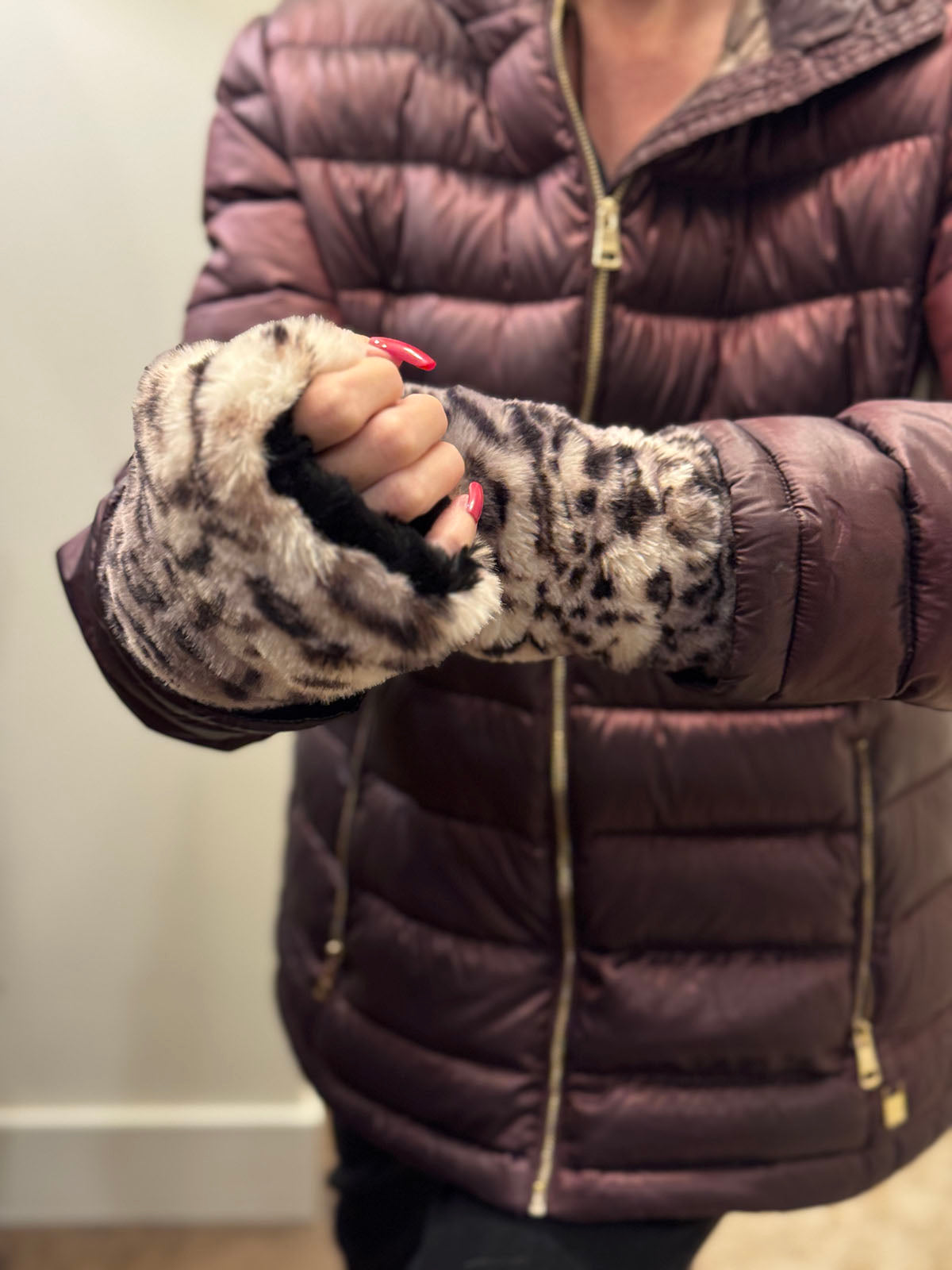 Woman wearing Royal Opulence Fingerless Gloves Short in Snow Leopard. Made in Seattle, WA, USA by Pandemonium Seattle.