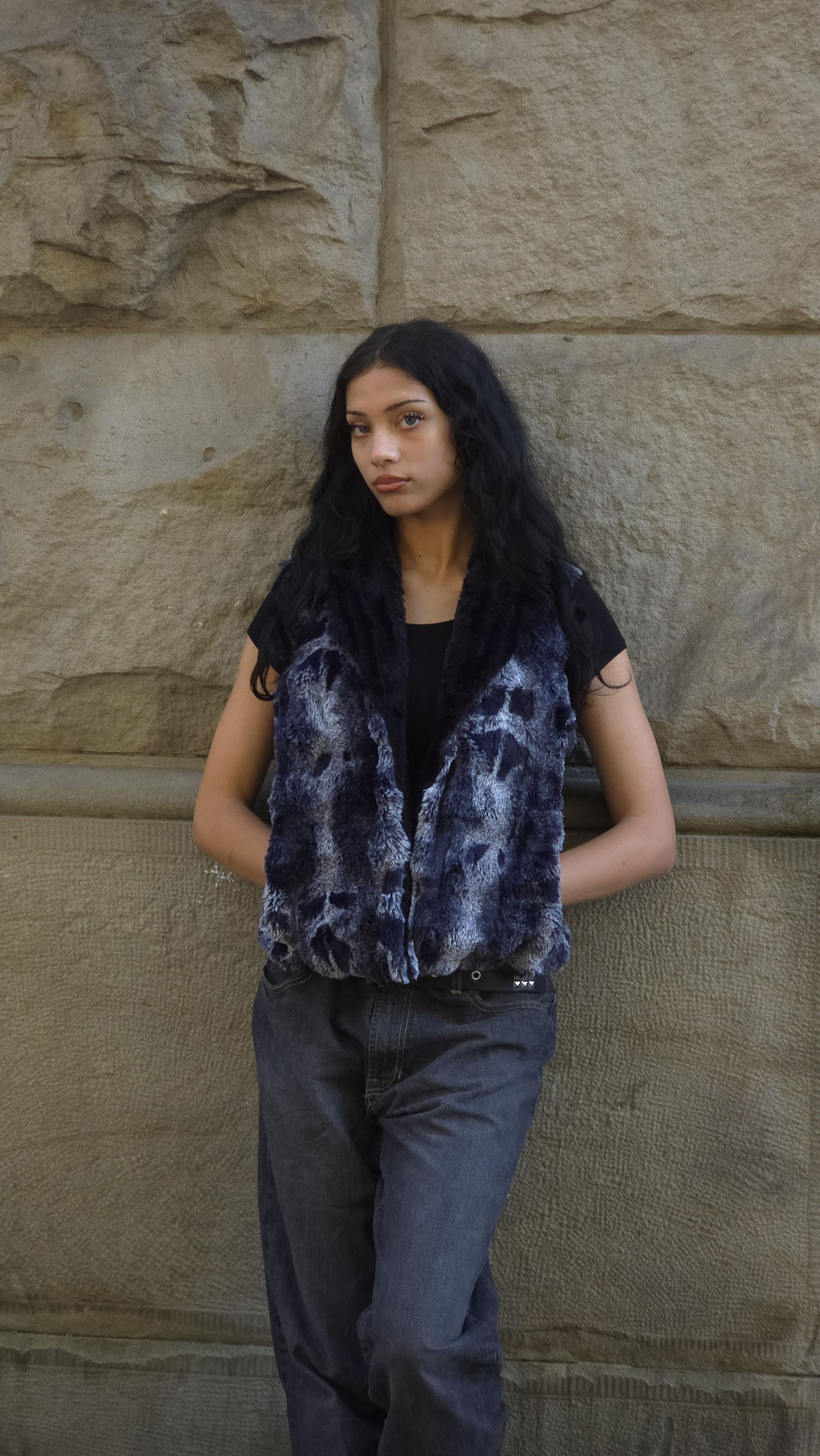 Woman wearing the Cloudwalk Shadow Shawl Collar Vest with single hook closure. Made in Seattle, WA, USA by Pandemonium Seattle.