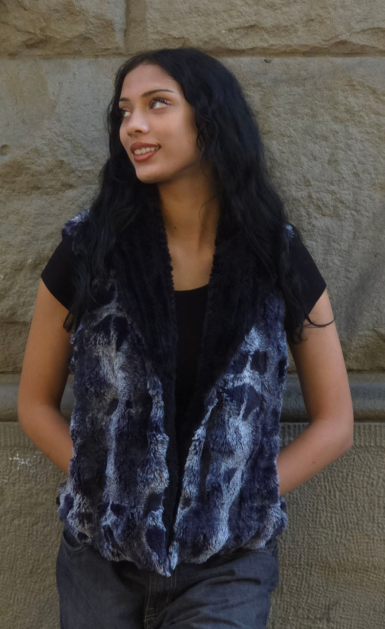 Woman wearing the Cloudwalk Shadow Shawl Collar Vest, with her hands in the pockets. Made in Seattle, WA, USA by Pandemonium Seattle.