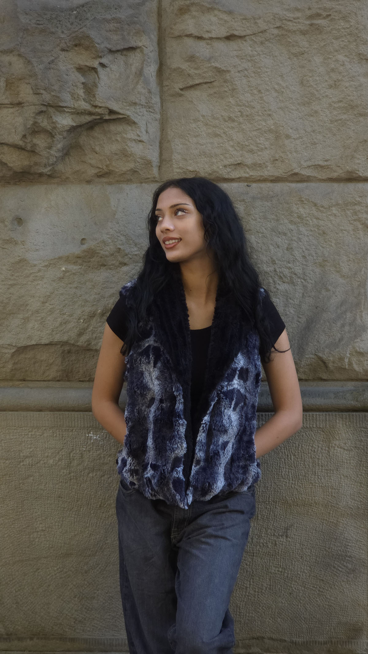 Woman wearing the Cloudwalk Shadow Shawl Collar Vest, with her hands in the pockets. Made in Seattle, WA, USA by Pandemonium Seattle.