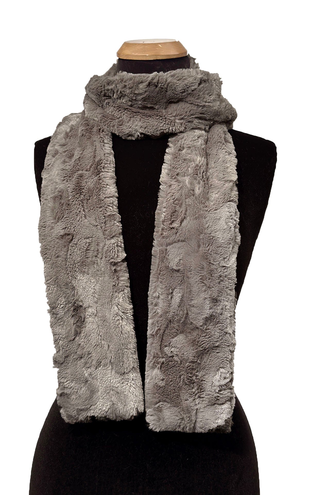 Classic Skinny Scarf in Cuddly Taupey Faux Fur is gently wrapped around the mannequin. Made in Seattle, WA, USA by Pandemonium Seattle.