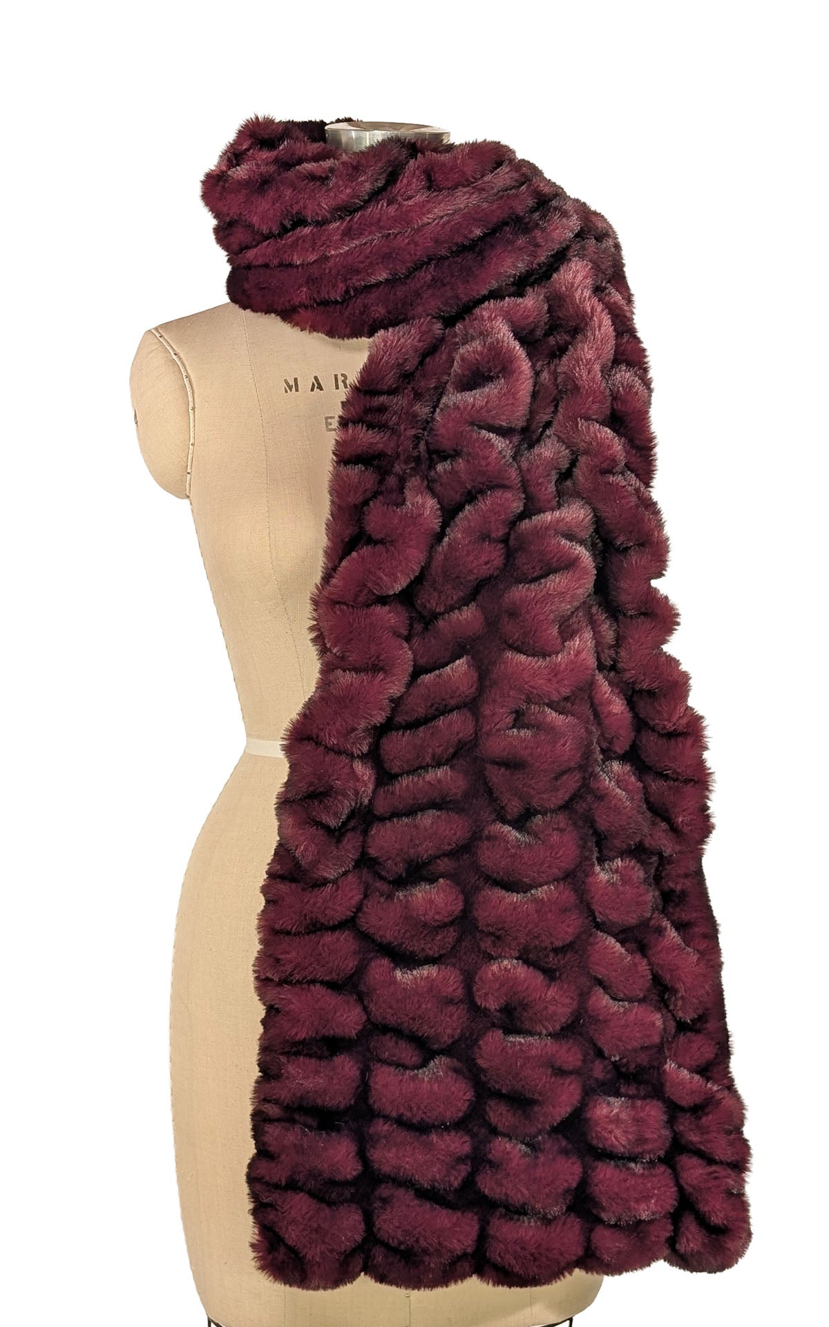 Stole shown in Royal Opulence Cherry Bomb Faux Fur. Styled like a traditional scarf with a drape over the left shoulder. Handsewn in Seattle WA, USA by Pandemonium Seattle.
