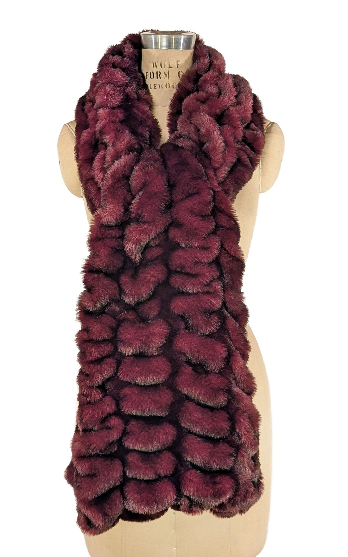 Stole in Royal Opulence Cherry Bomb Faux Fur featured on a mannequin. Styled with a classic drape even o n both shoulders with pull through look. Handmade in Seattle WA, USA by Pandemonium Seattle.