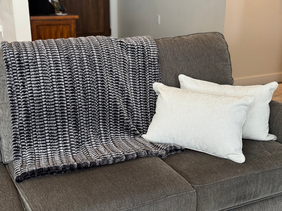 Sofa with Throw in 8MM Black and White. Made in Seattle, WA, USA by Pandemonium Millinery.