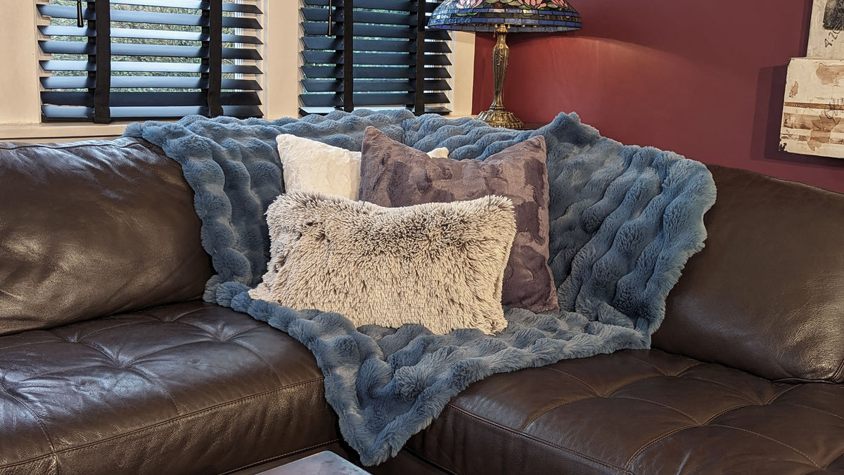 Pillows and Blanket on Couch | Throw in Enchanted Dreams Bluebell pillows in Pearl Fox, Ivory and Cool Gray Faux Fur | Handmade in the USA by Pandemonium Millinery
