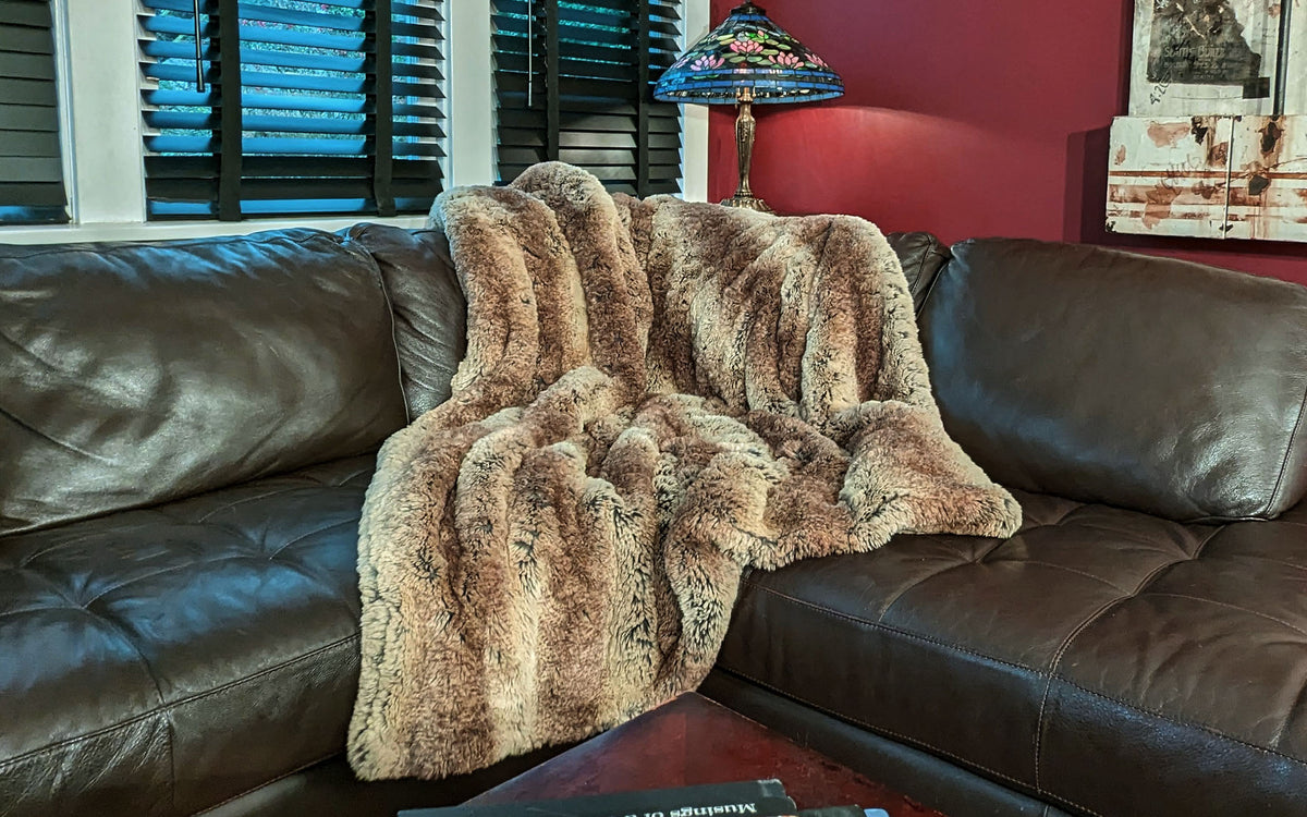 Throw on Couch | Savannah with Chocolate Satin Backing | Tissavel Faux Fur Throws | Pandemonium Millinery