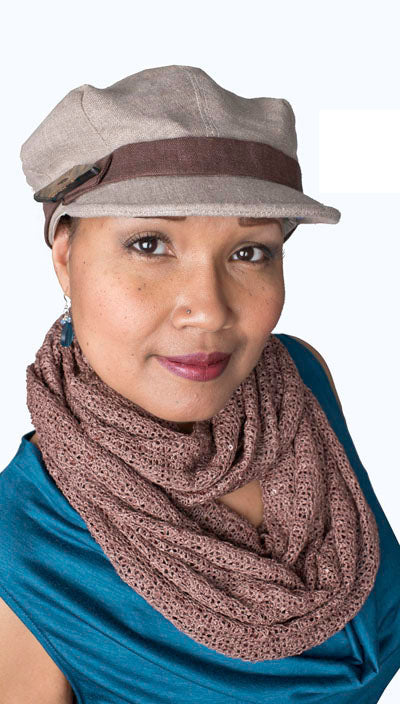 Model wearing a Valerie Cap style hat and a Wide Infinity Loop Scarf | Glitzy Glam in Toffee, an open-weave knit with delicate sequins throughout, Brown, Tan | Handmade in Seattle WA | Pandemonium Millinery