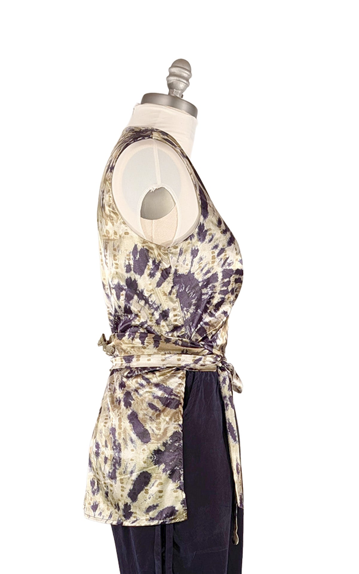 Side view of the sleeveless Wrap Top in Egyptian Oasis fabric, shown with the ties wrapped at the waist for a form fitting look. Made in Seattle, WA, USA by Pandemonium Seattle.