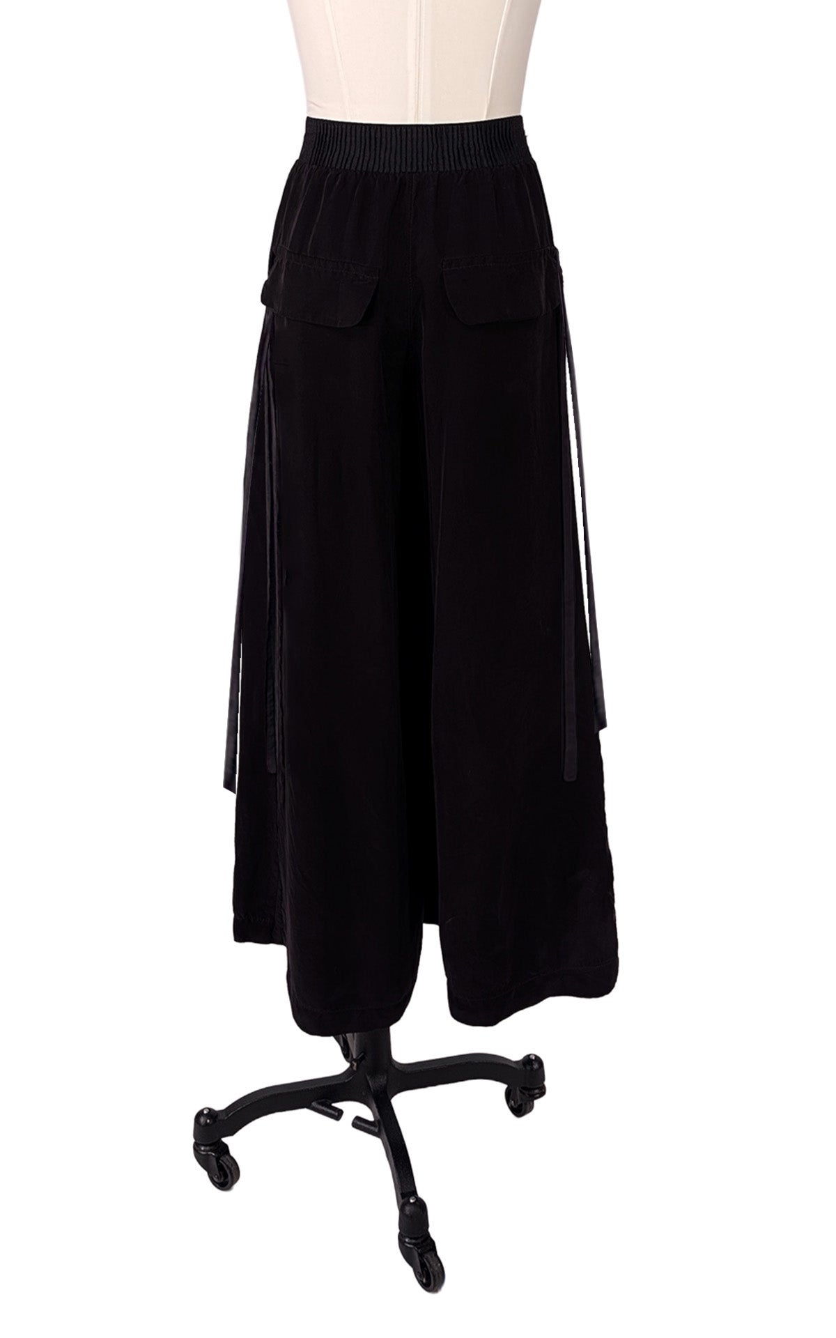 Wide Leg Pleated Pants in Obisidian Cupro fabric. Shown front view of pants. Made in Seattle, WA, USA by Pandemonium Seattle.