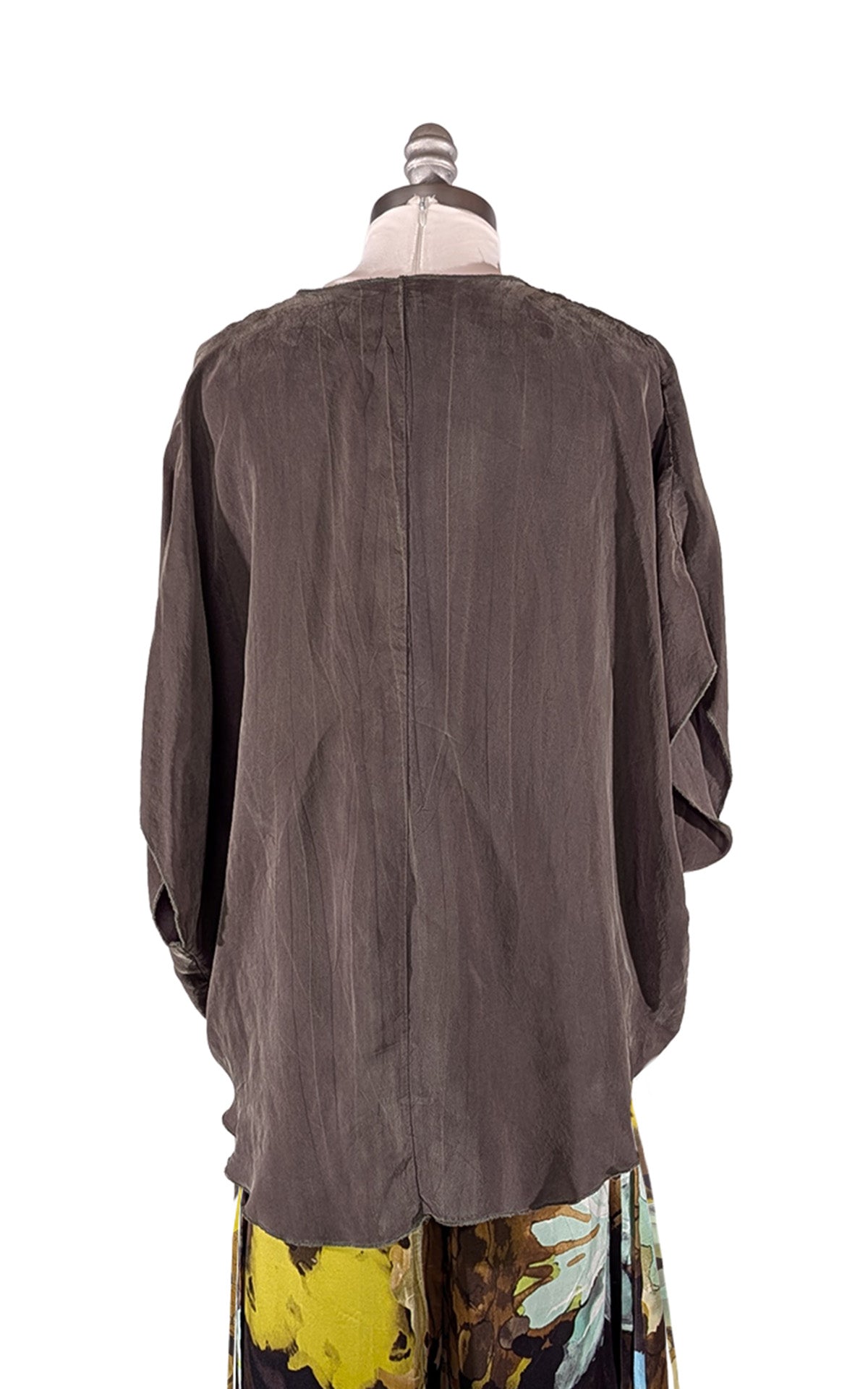Crossover Top in Dusk Olive Cupro silk alternative, shown on a dress form with the back view untucked over the Silk Fiesta Masquerade Pleated Pants. Made in Seattle, WA, USA by Pandemonium Seattle.