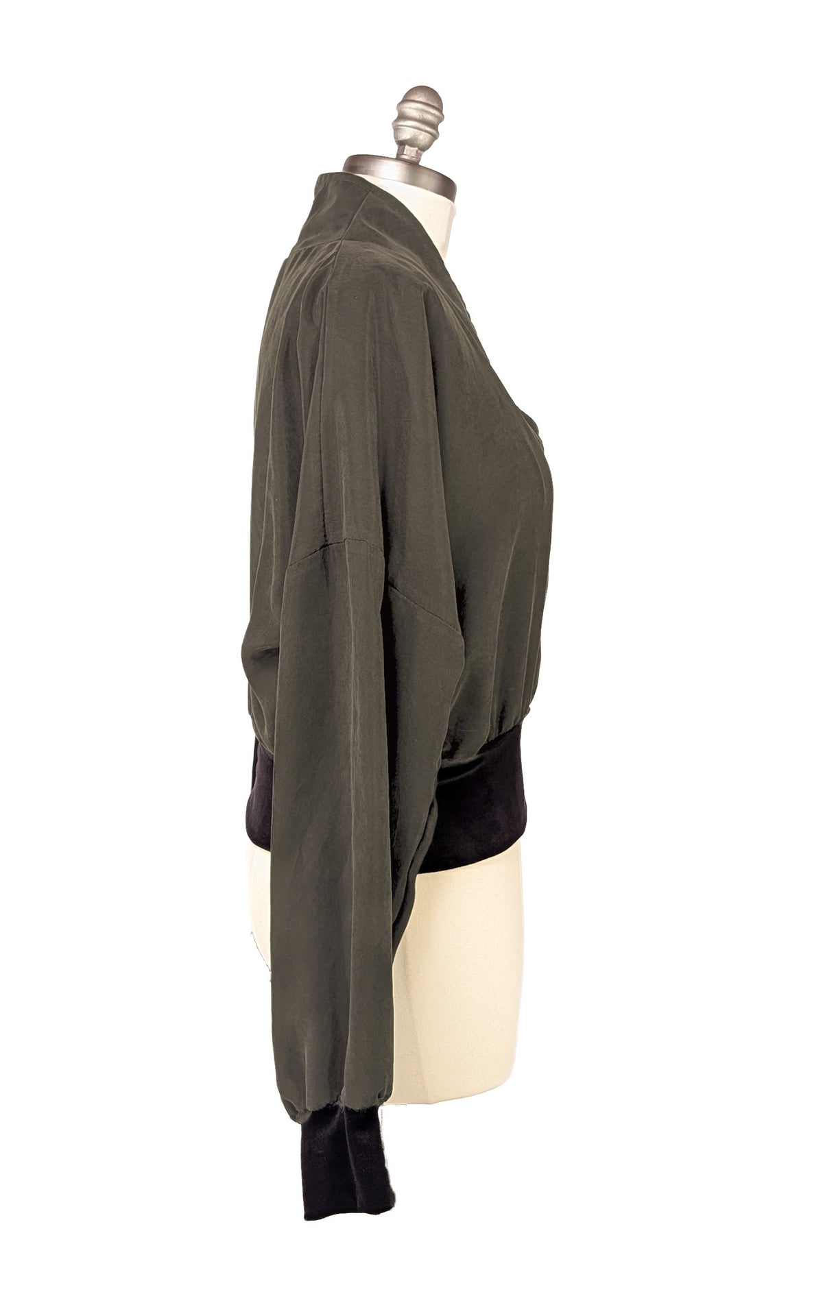 Dusk Olive Green Zipper Jacket shown in side view, on a mannequin. Made in Seattle, WA, USA by Pandemonium Seattle.