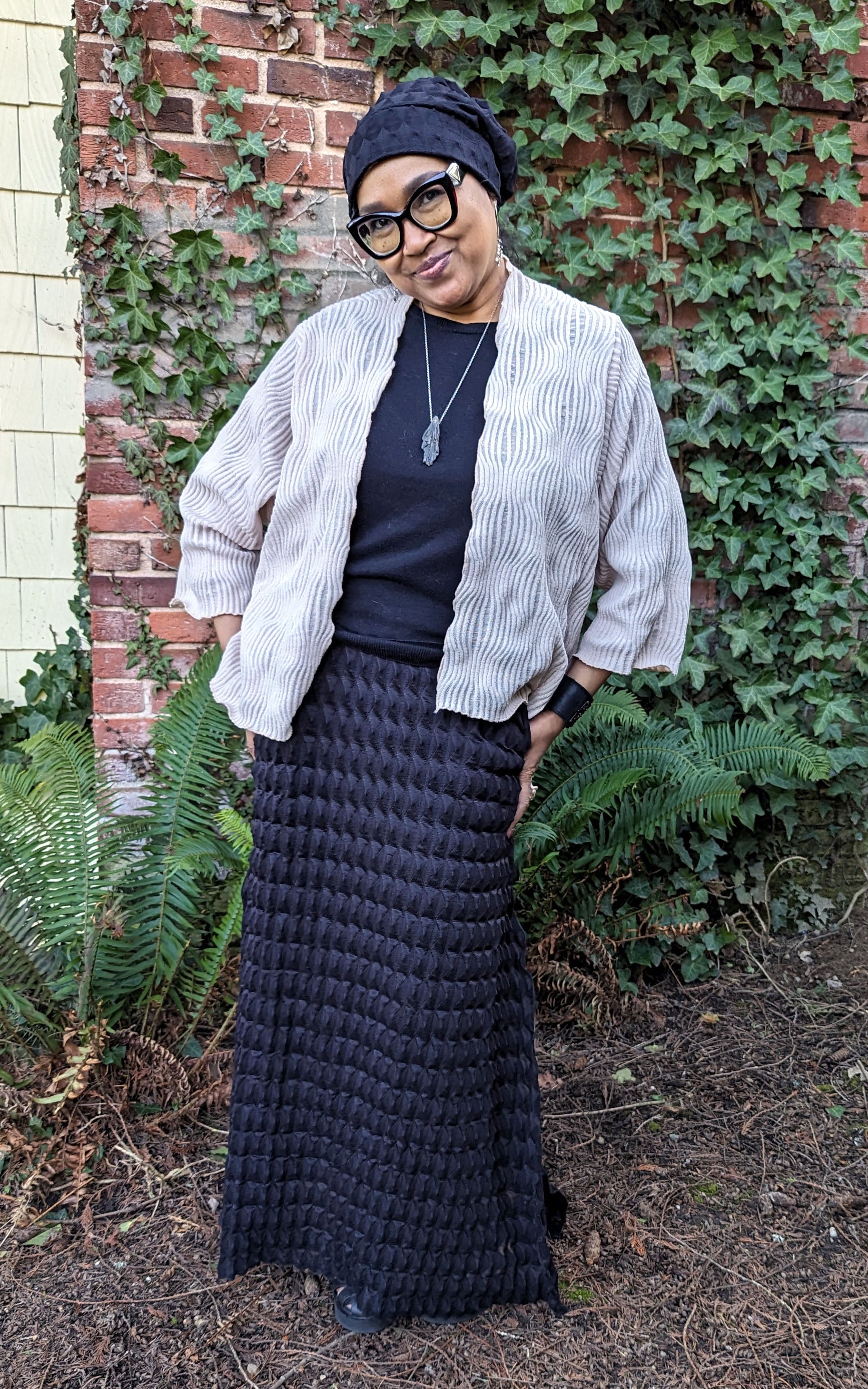 Model in A-Line Skirt and Cardigan in Cerulean Blue, from the LYC/Pandemonium Seattle Fractal Collection. Handmade in Seattle, WA, USA.