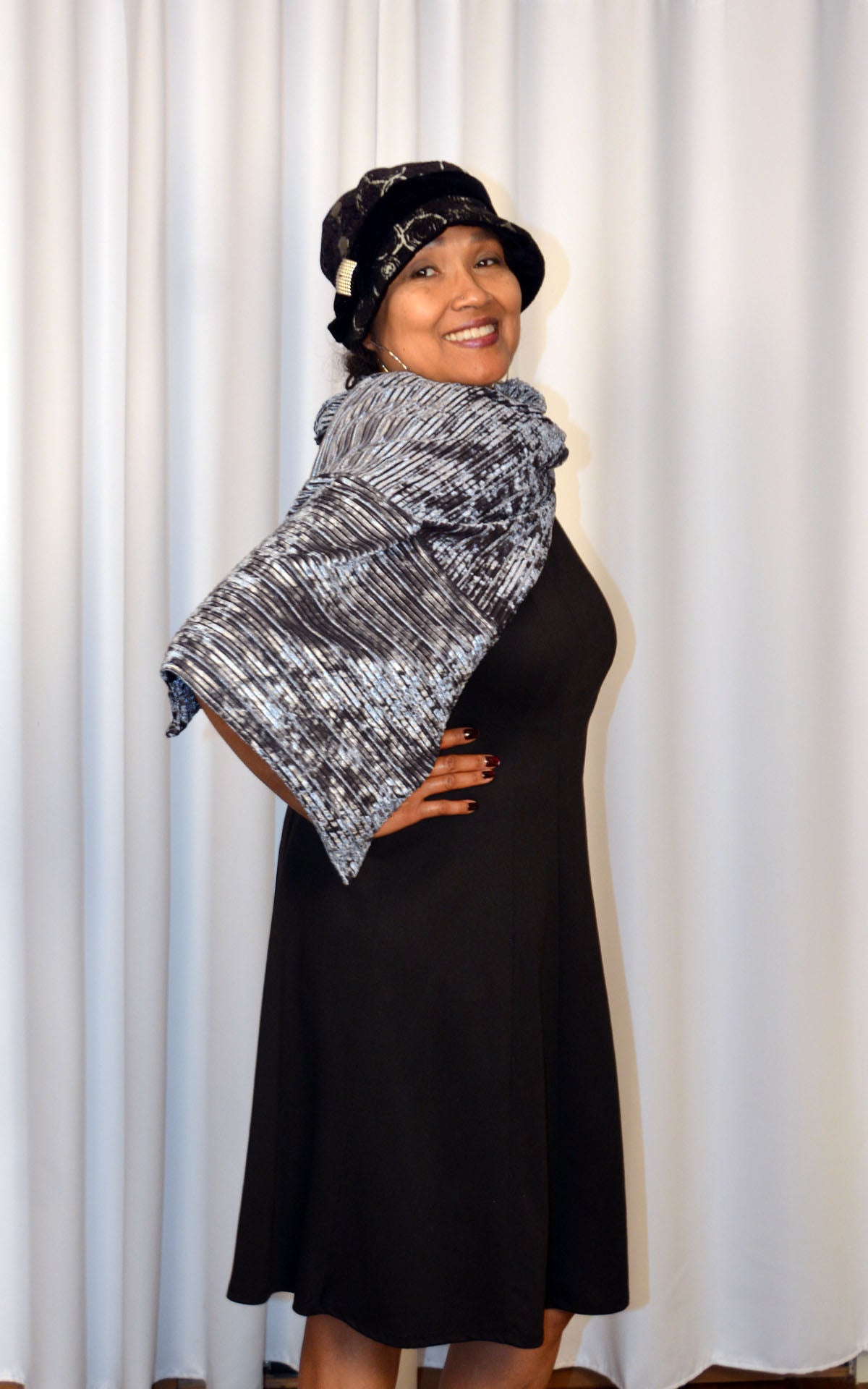 Woman wearing Evening Wrap in Socialite, a silvery Pleated Velvet handmade in USA by Pandemonium Seattle