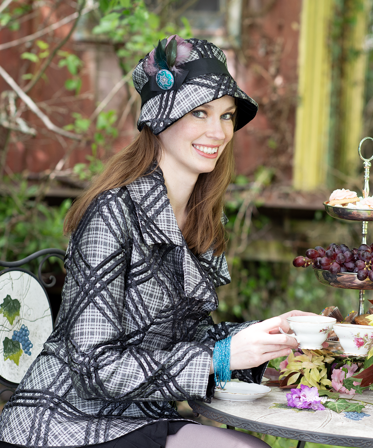 Woman wearing Abigail Hat in Silver Plaid with Black Velvet Band, Feather and Button | Handmade in Seattle WA | Pandemonium Millinery