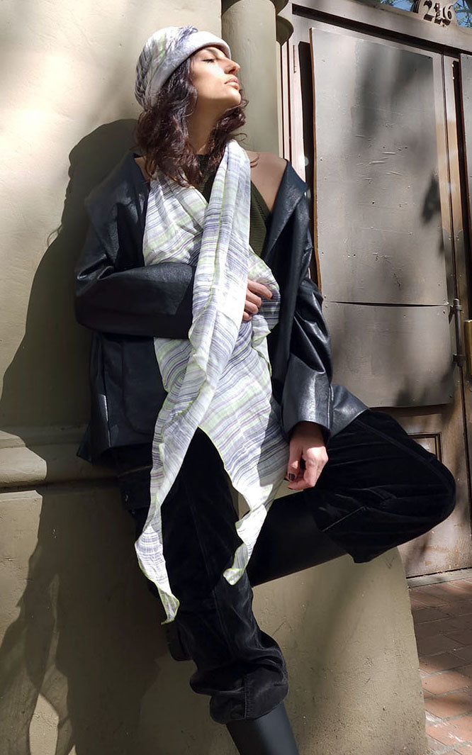Model leaning against a wall wearing Ana 1930’s Cloche style hat and matching  Ladies Handkerchief Scarf, Large Wrap | Shown in Spring Linen striped print Lime Green, Black, Gray, Ivory | Handmade in Seattle WA | Pandemonium Millinery