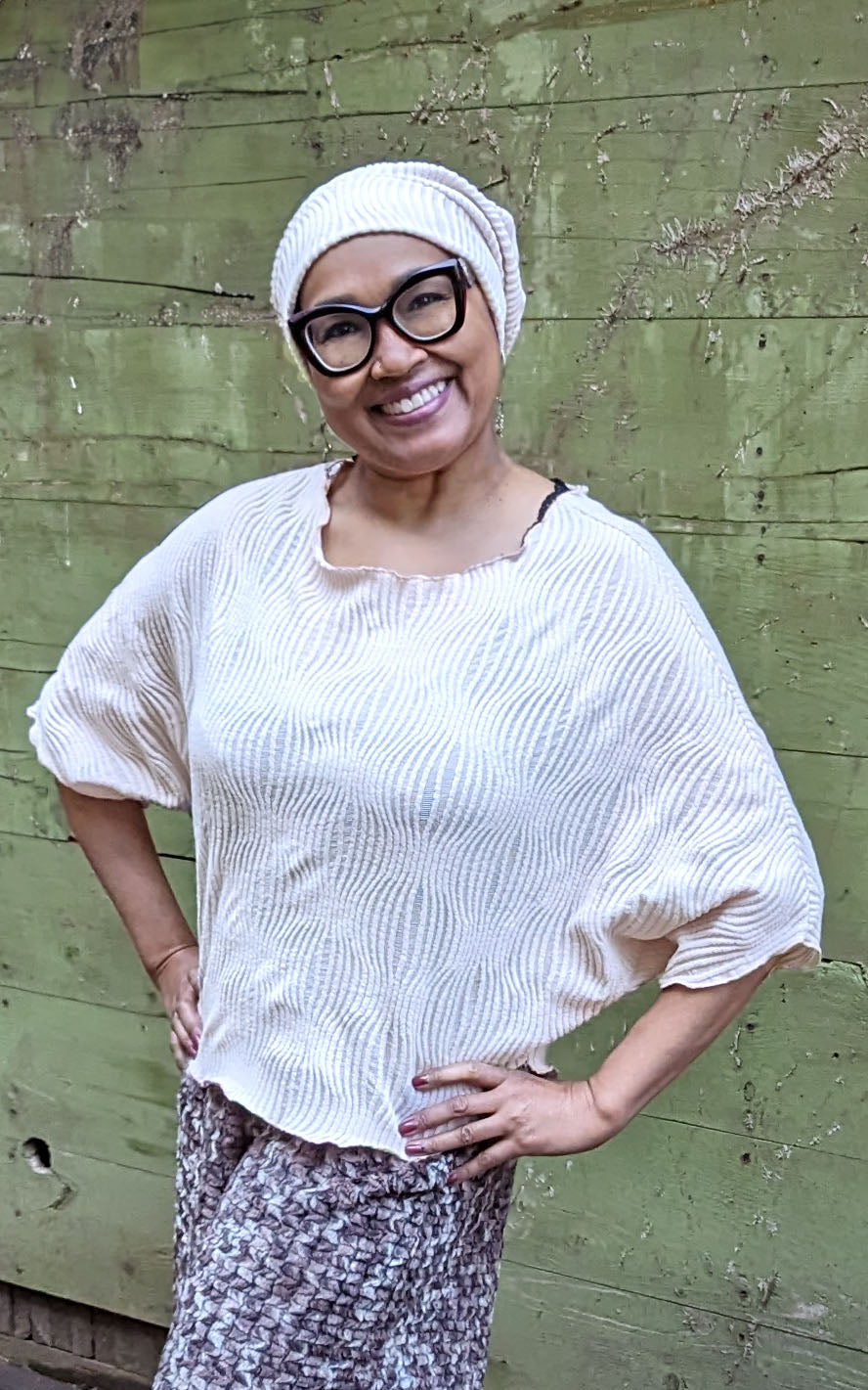 Model photo of the Batwing Top and Rowdie Hat in Blush, from the Fractal Collection. LYC and Pandemonium Seattle are handmade in Seattle, WA, USA.