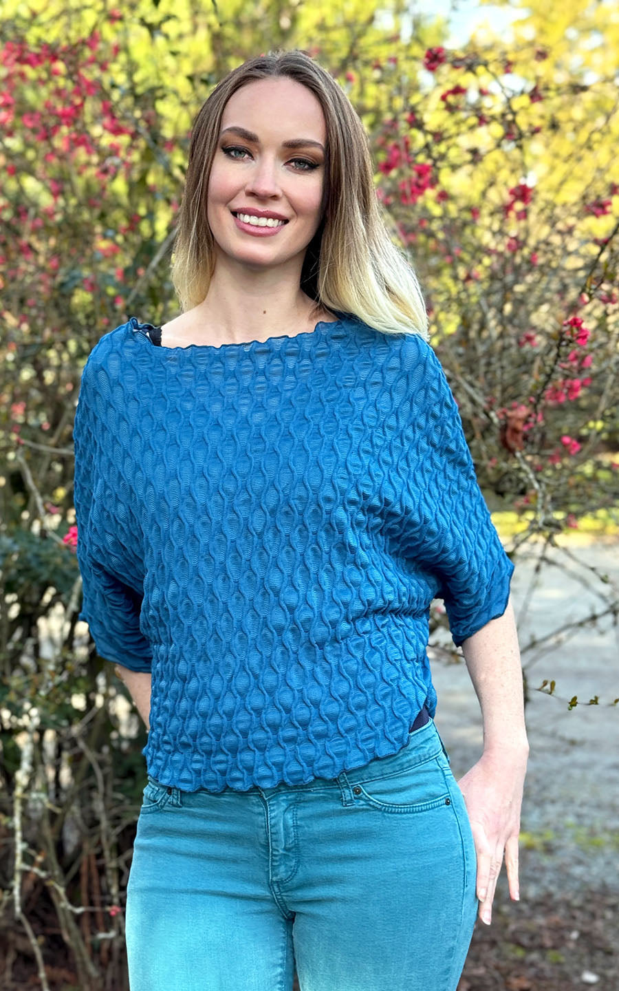 Model photo of the Batwing Top in Cerulean Blue, from the Fractal Collection. LYC and Pandemonium Seattle are handmade in Seattle, WA, USA.