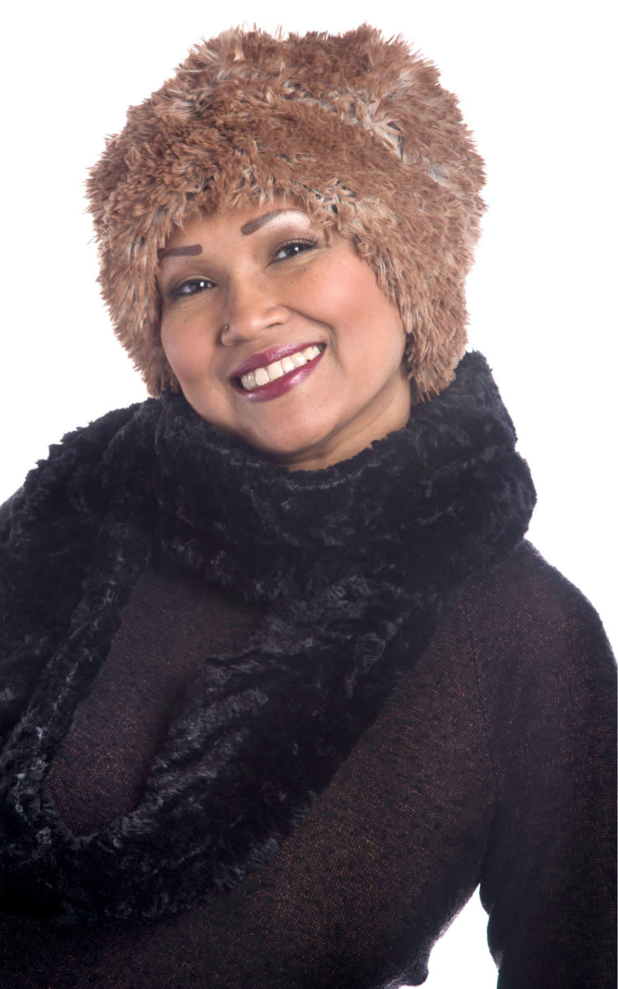 Model is wearing Infinity Scarf in Cuddly Faux Fur in Copper River with Frosted Cedar Faux Fur Mittens and Cuffed Pillbox by Pandemonium Seattle