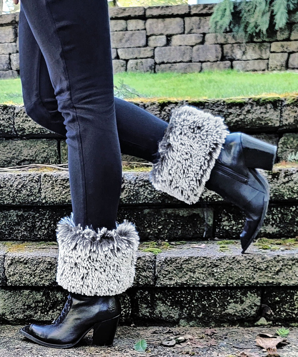 Model legs on cement steps | Boot Toppers Silver Tipped Fox in Black Faux Fur | Handmade USA Pandemonium Seattle