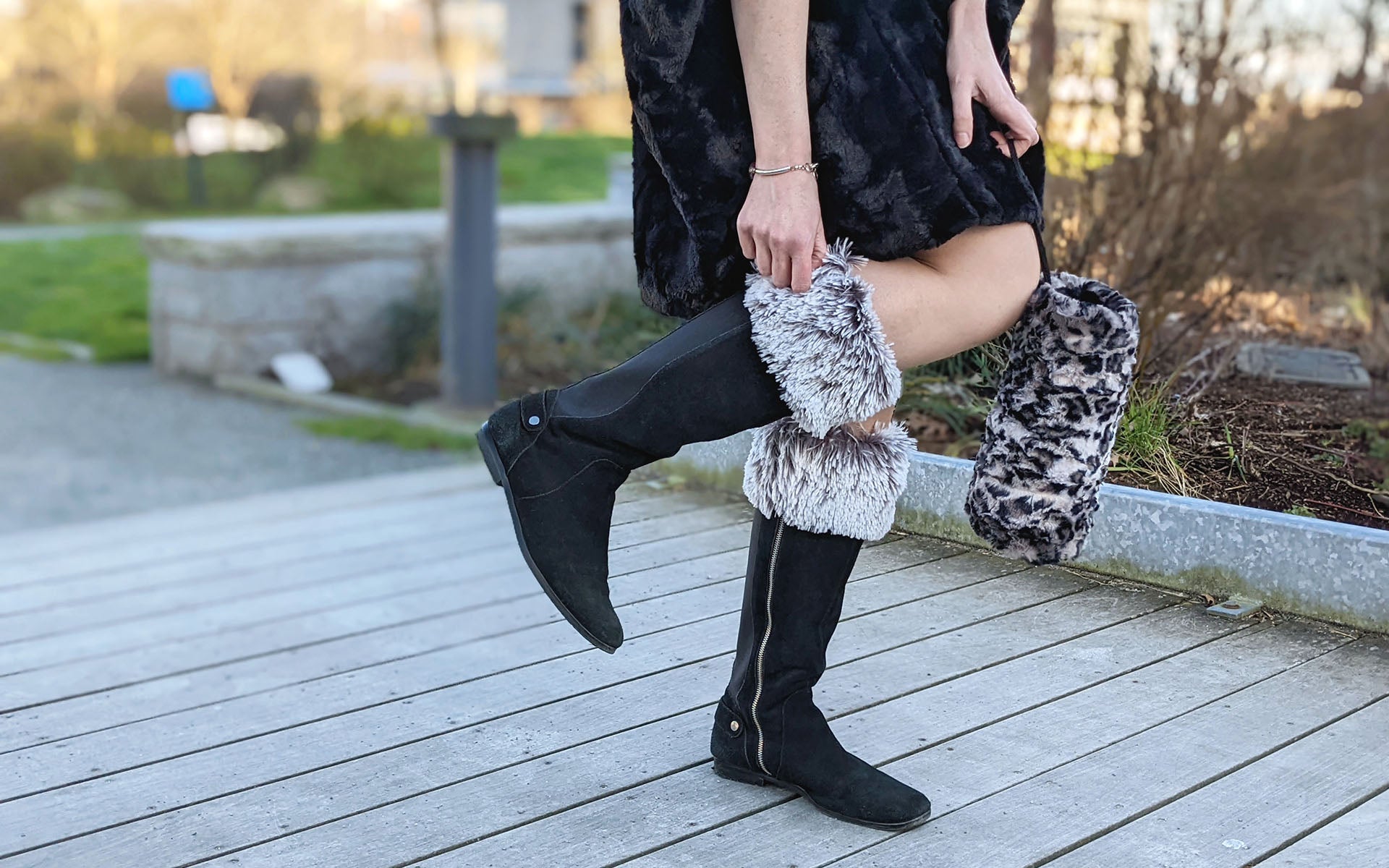 Model legs on cement steps | Boot Toppers Silver Tipped Fox in Black Faux Fur | Handmade USA Pandemonium Seattle