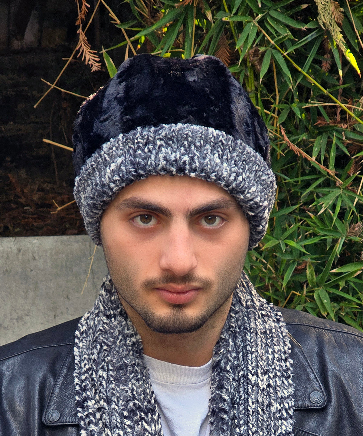 Model wearing a Men's Reversible Beanie | Cozy Cable Faux Fur, Reversed | Handmade in Seattle, WA, USA | By Pandemonium MIllinery