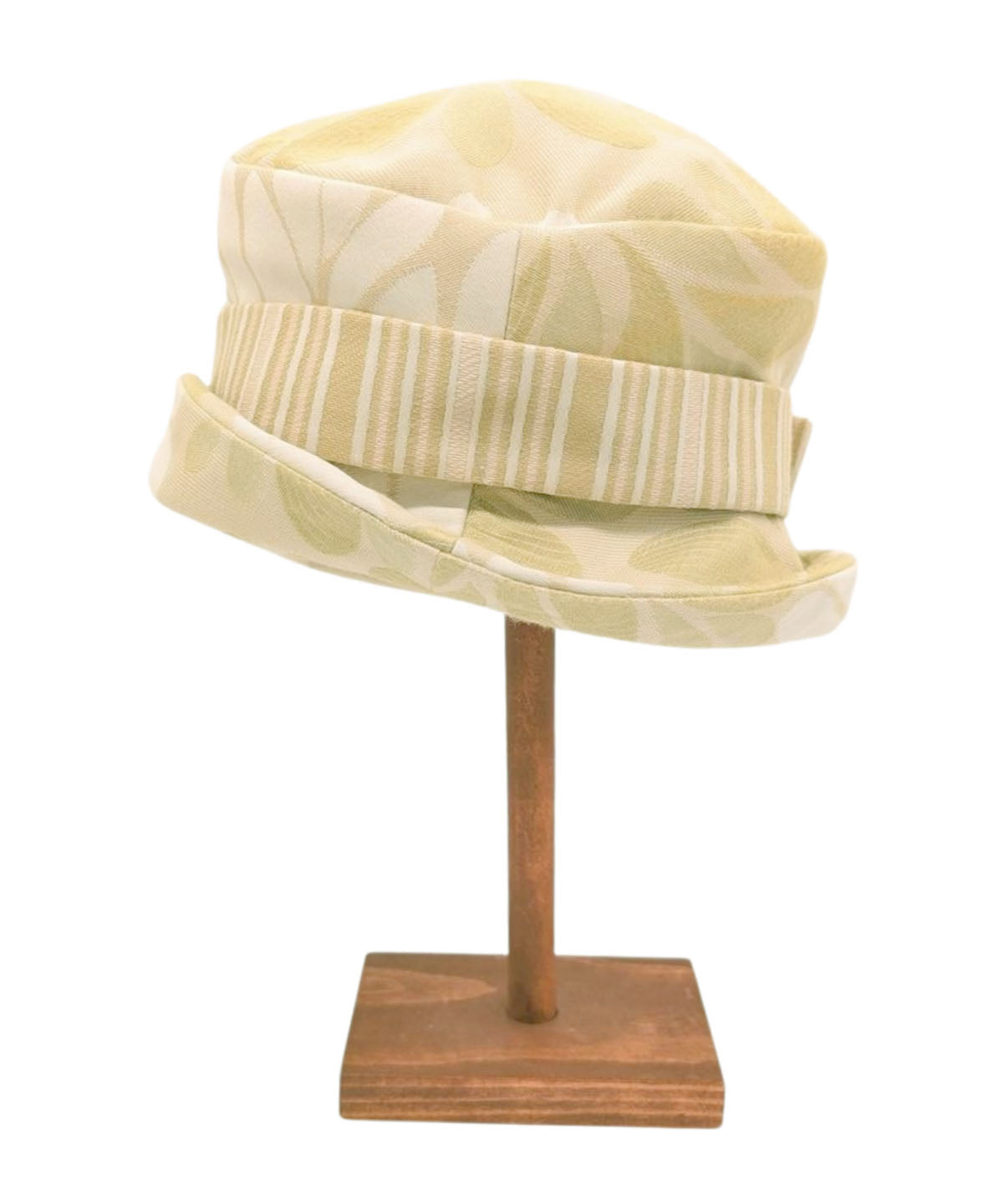 Back view of Women&#39;s Cleo Bucket Hat in Daisy Kiwi with a coordinating Kiwi Stripe Band and large button detail | Handmade in Seattle WA | Pandemonium Millinery