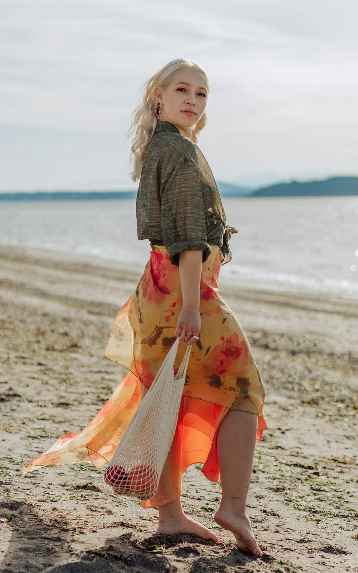 Coastal Garden Wrap in Sun Star Model Shot on Beach Side view| Handmade in Seattle WA | Pandemonium Millinery