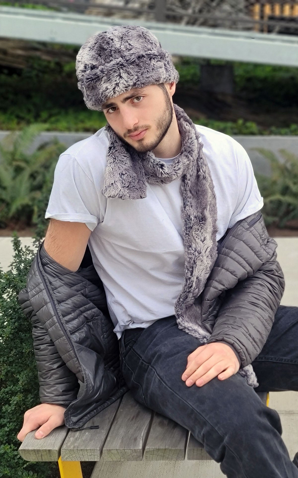 Man modeling our Cuffed Pillbox in Seattle Sky faux fur with Black Cuddly reverse side. Handmade in Seattle, Washington by Pandemonium Seattle.