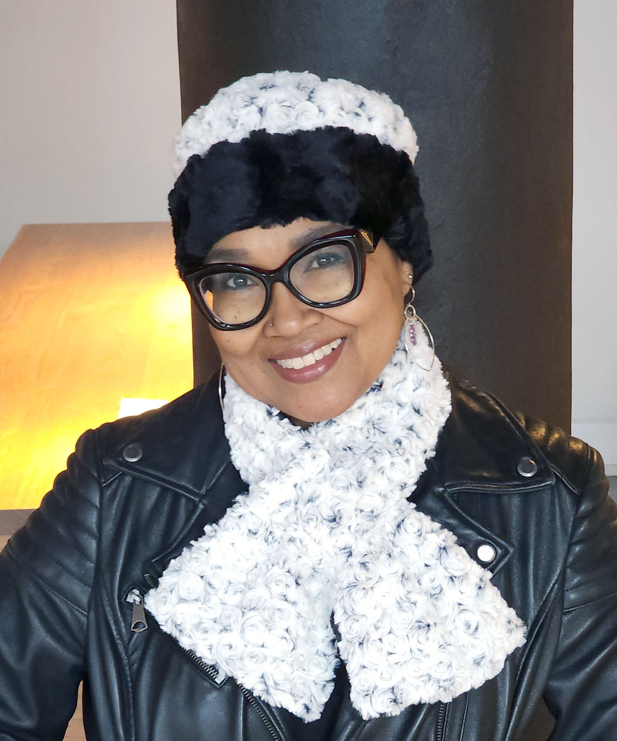   Women's reversible Cuffed Pillbox on model shown in reverse | Rosebud Black Faux Fur with Cuddly Fur in Black and matching Pull Thru scarf | Handmade USA by Pandemonium Seattle