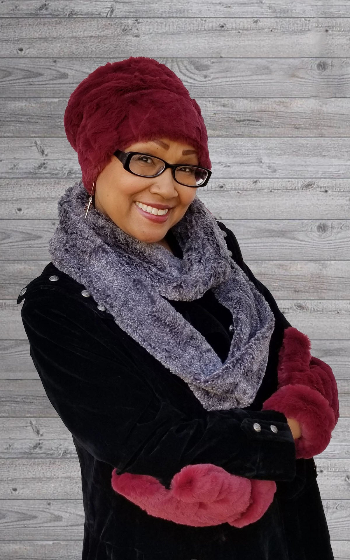 Model against a wall wearing women's cuffed pillbox,  mittens Classic Skinny Scarf   | Nimbus Faux Fur, blacks and gray | Handmade in Seattle WA Pandemonium Millinery