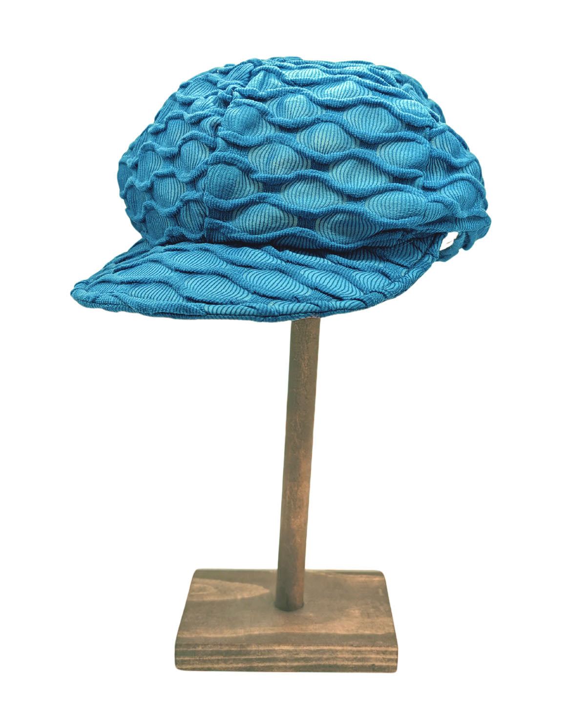 Woman wearing Dianne Cap shown in Burn Sienna Fractal Handmade in USA by Pandemonium Millinery