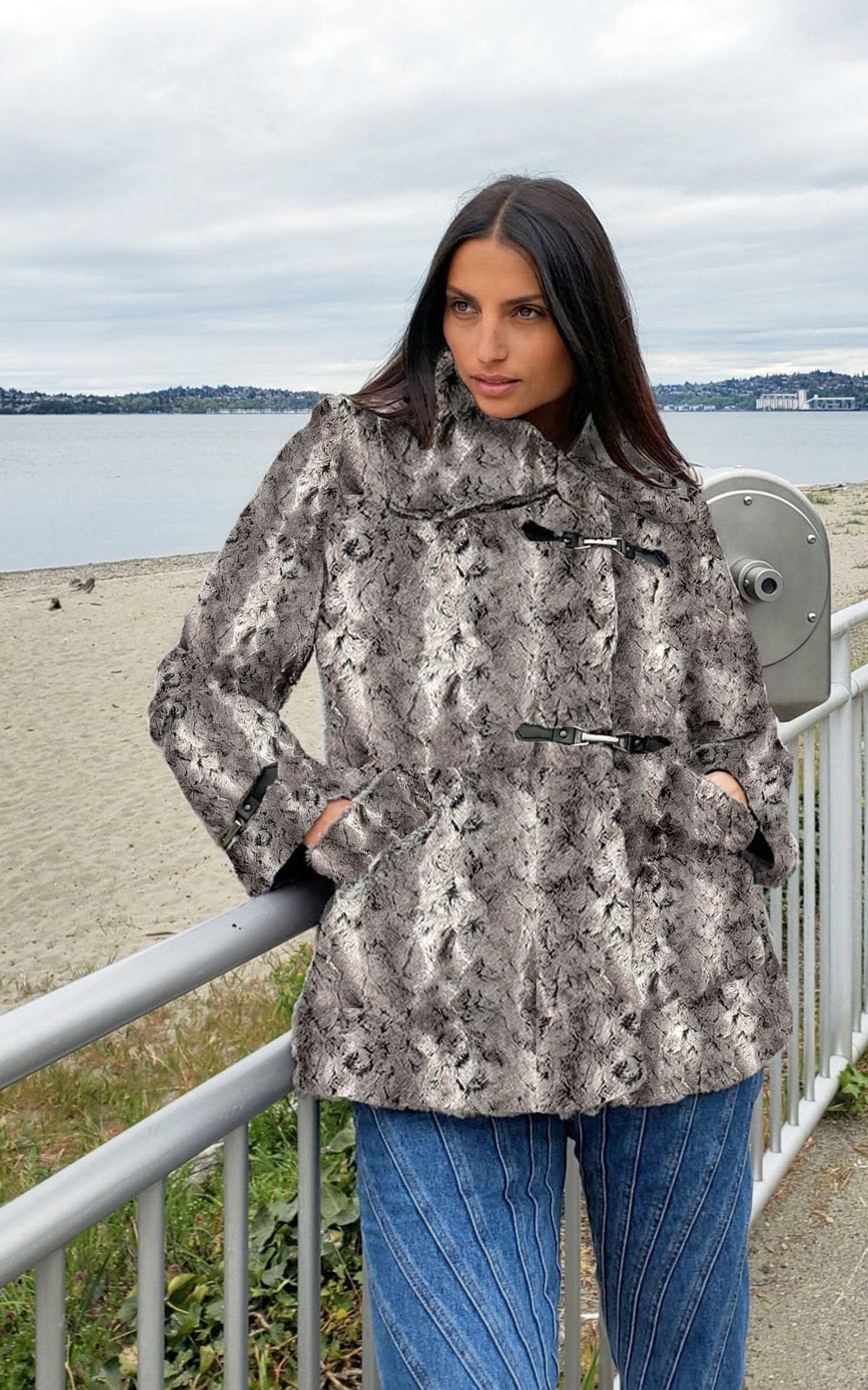 Model by the water wearing the Dietrich Coat | Seattle  Sky Grayish Faux Fur Pea Coat | Featuring Buckle Clasps | Handmade in Seattle, WA | Pandemonium Millinery