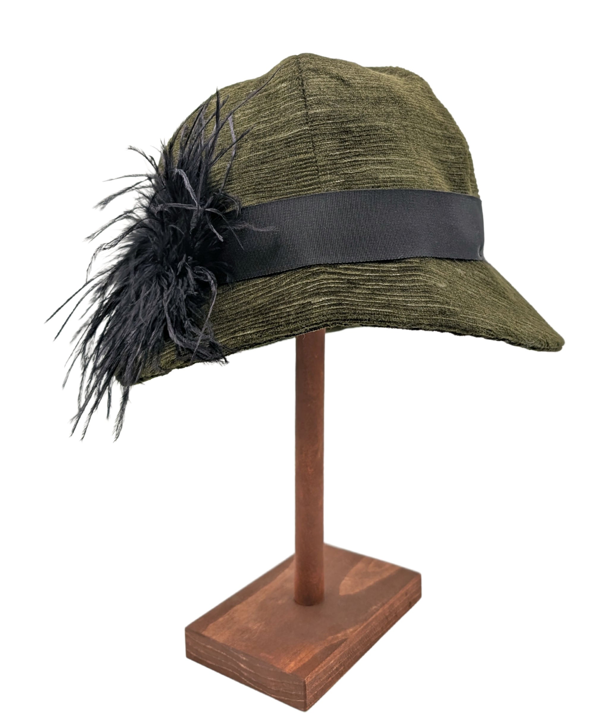 Grace Cloche Style Hat Side View | Shown in Cohen in Olive with Black Grosgrain Band and Black Ostrich Feather Brooch | By Pandemonium Seattle | Handmade in USA