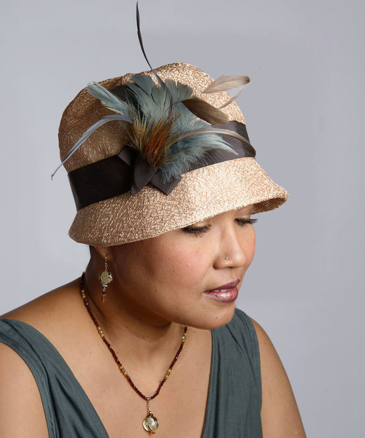 Grace Cloche Style Hat Tumbleweed in Champagne with Chocolate Grosgrain featuring Steel and Pheasant Feather Brooch | By Pandemonium Millinery | Handmade in Seattle WA USA