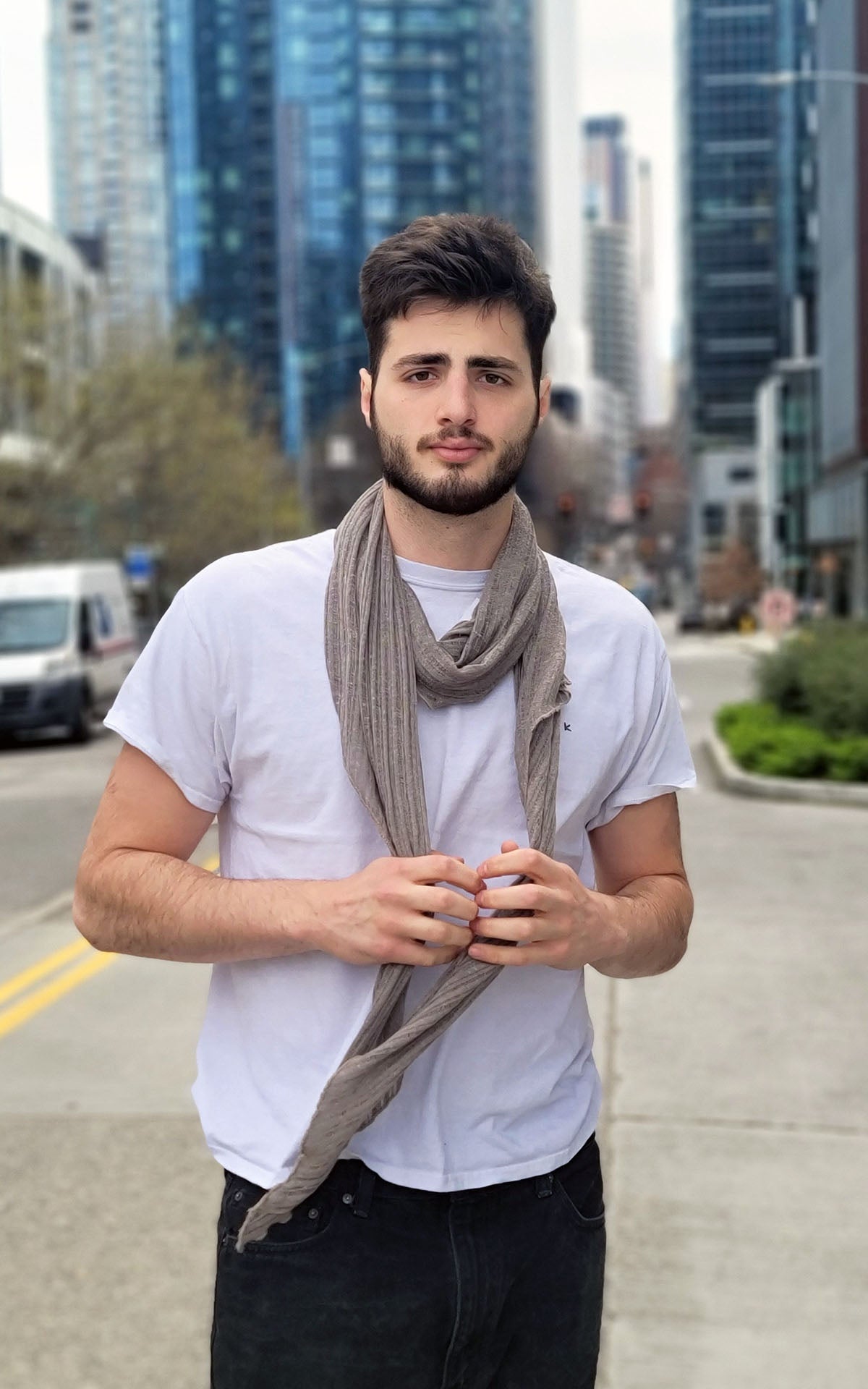 Man standing in downtown street  wearing large Handkerchief scarf | Cotton Voile, in Earth, a  tan, taupe color| Handmade in Seattle WA | Pandemonium Millinery