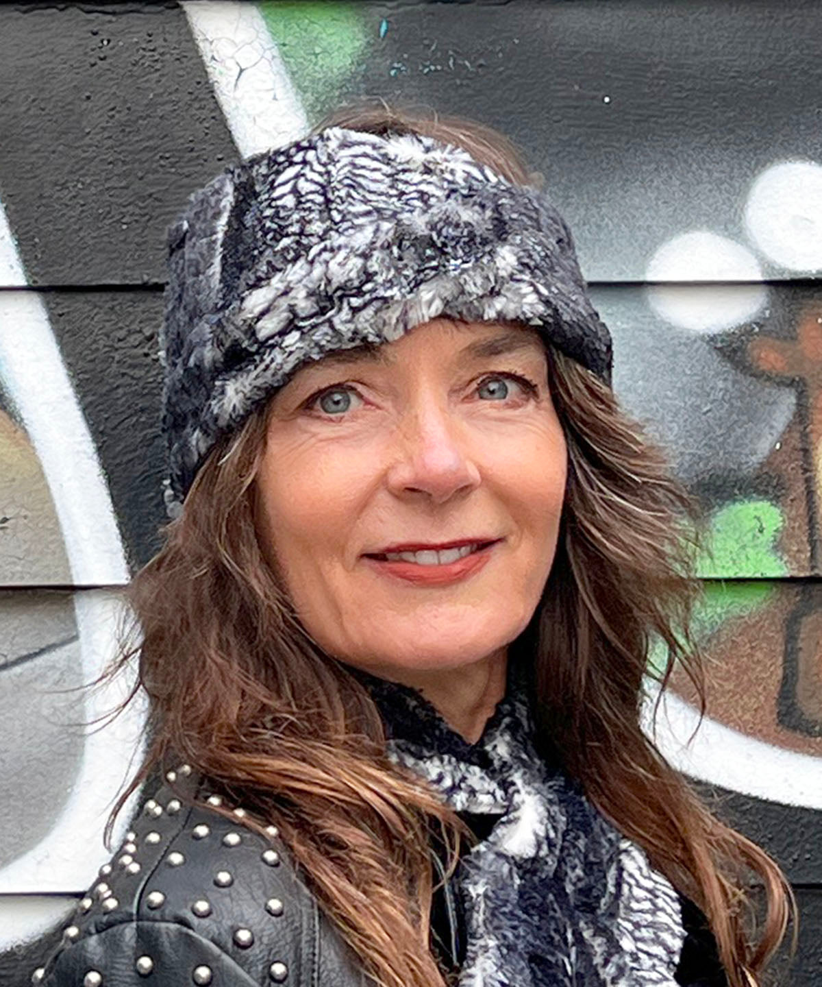 Product shot of  headband /  neck warmer in black mamba faux fur handmade in seattle wa usa by Pandemonium Millinery