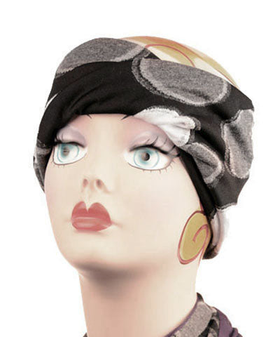 Mannequin Product shot of Headband with Twist | Nova Black and White Circular Fabric | | Handmade by Pandemonium Millinery Seattle, WA USA