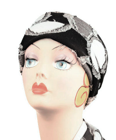 Mannequin Product shot of wide Headband | Super Nova Black and White Circular Fabric | | Handmade by Pandemonium Millinery Seattle, WA USA