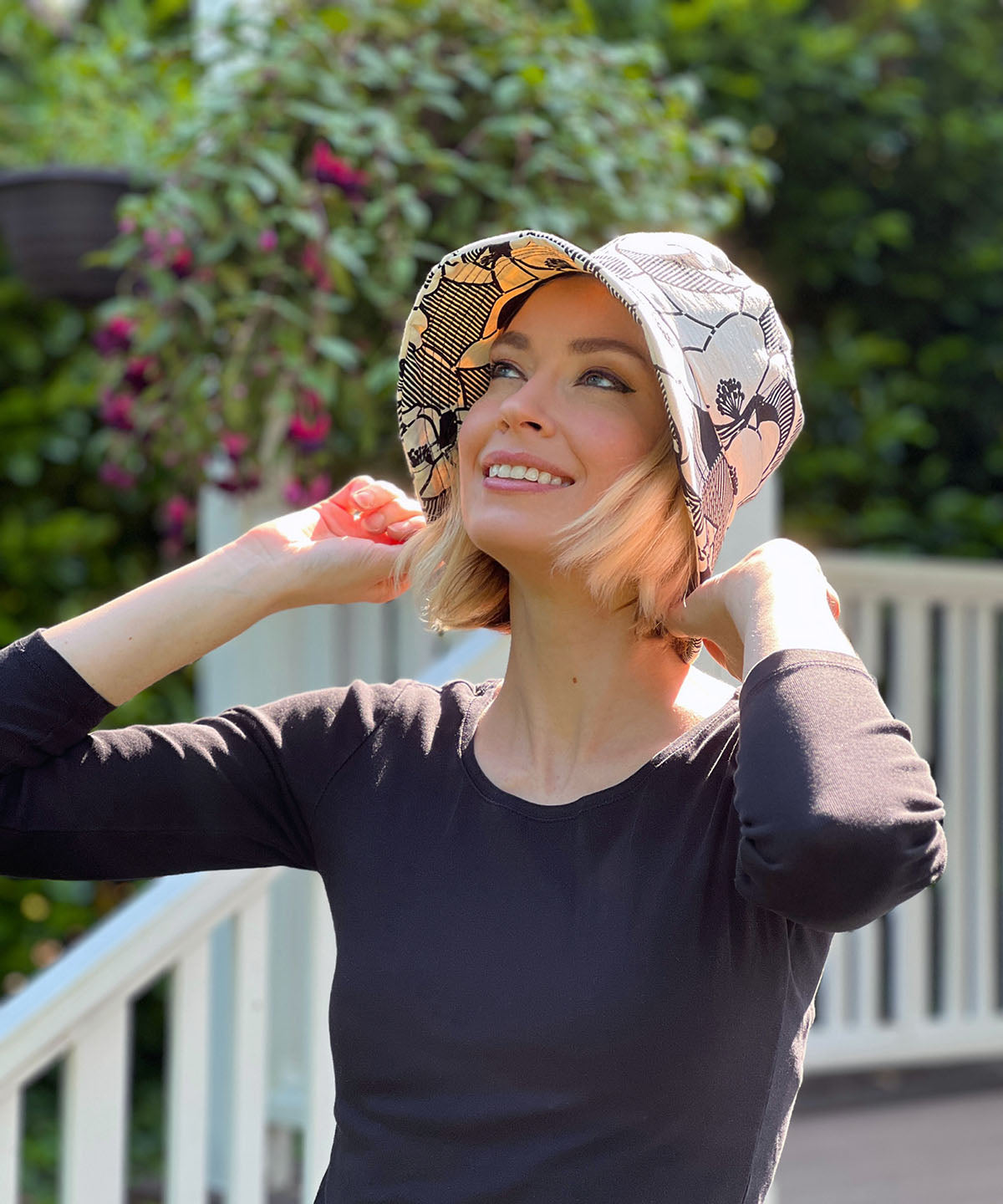 Woman wearing Hollie Sun Hat in Art Deco. Handmade in America by Pandemonium Seattle.