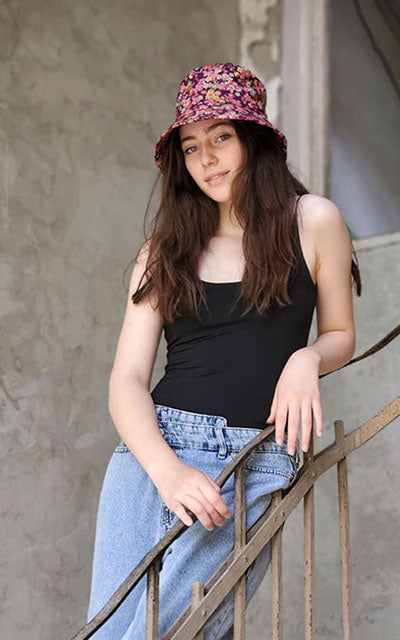Model features Hollie Sun Hat in Purple Hana. Handmade in USA by Pandemonium Seattle.