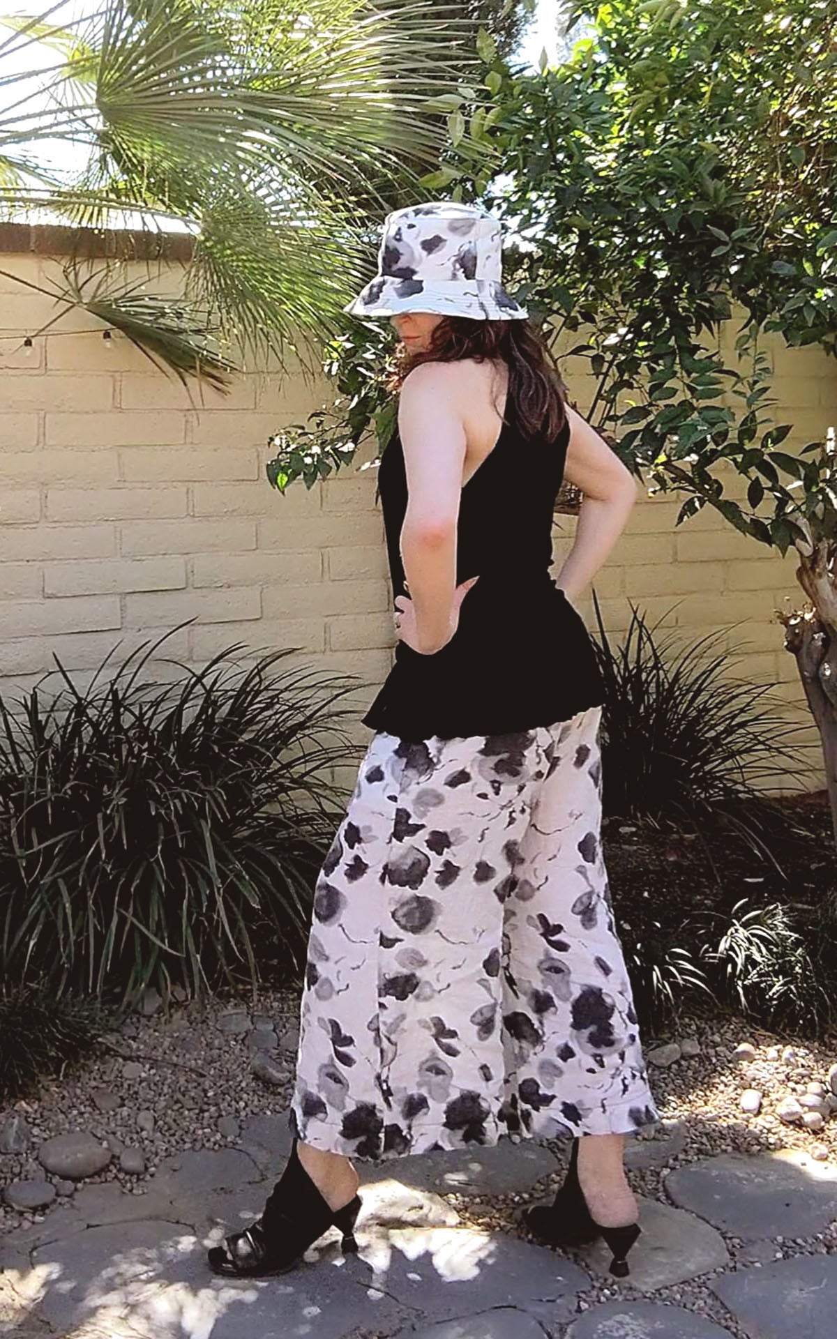 Hollie Bucket Hat on model in Black/White Floral Linen | Handmade in Seattle WA | Pandemonium Millinery
