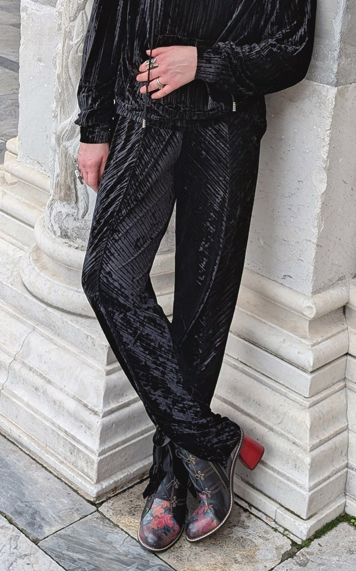 Woman wearing pants in Night Owl Pleated Velvet handmade in USA by Pandemonium Seattle