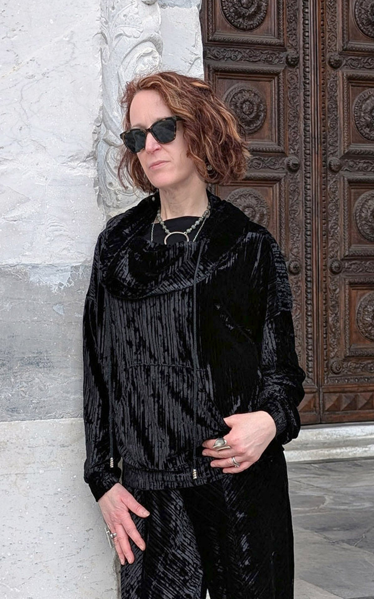 Close up Woman wearing Slice of Life Hooded Sweatshirt in night owl Pleated Velvet with hood down handmade in USA by Pandemonium Seattle